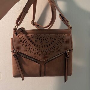 Elegant Brown Handbag with Cutout Design